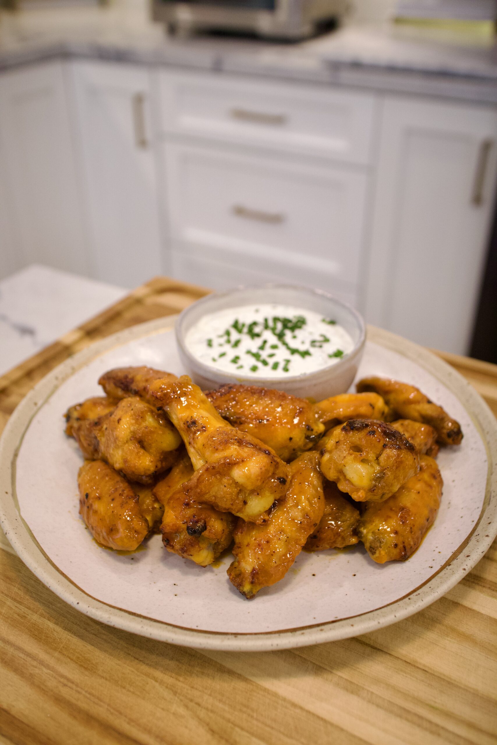 some of the best game day recipes includes these easy, quick, and delicious Buffalo Chicken Wings with Homemade Ranch Dip